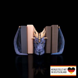 Frontansicht der handbemalten Drachen Buchstütze mit großem Kopf und Flügeln