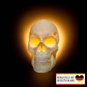 Frontansicht der leuchtenden Totenkopf-Wandlampe mit warmem LED-Effekt