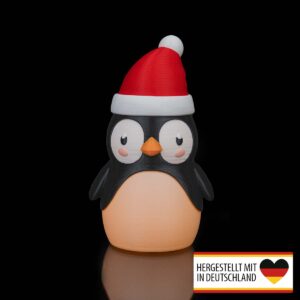 Weihnachts Pinguin LED Teelichthalter mit roter Weihnachtsmütze – Frontansicht