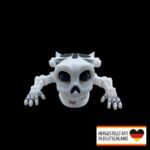 Seitliche Ansicht des Skelett Untersetzers auf einem Tisch